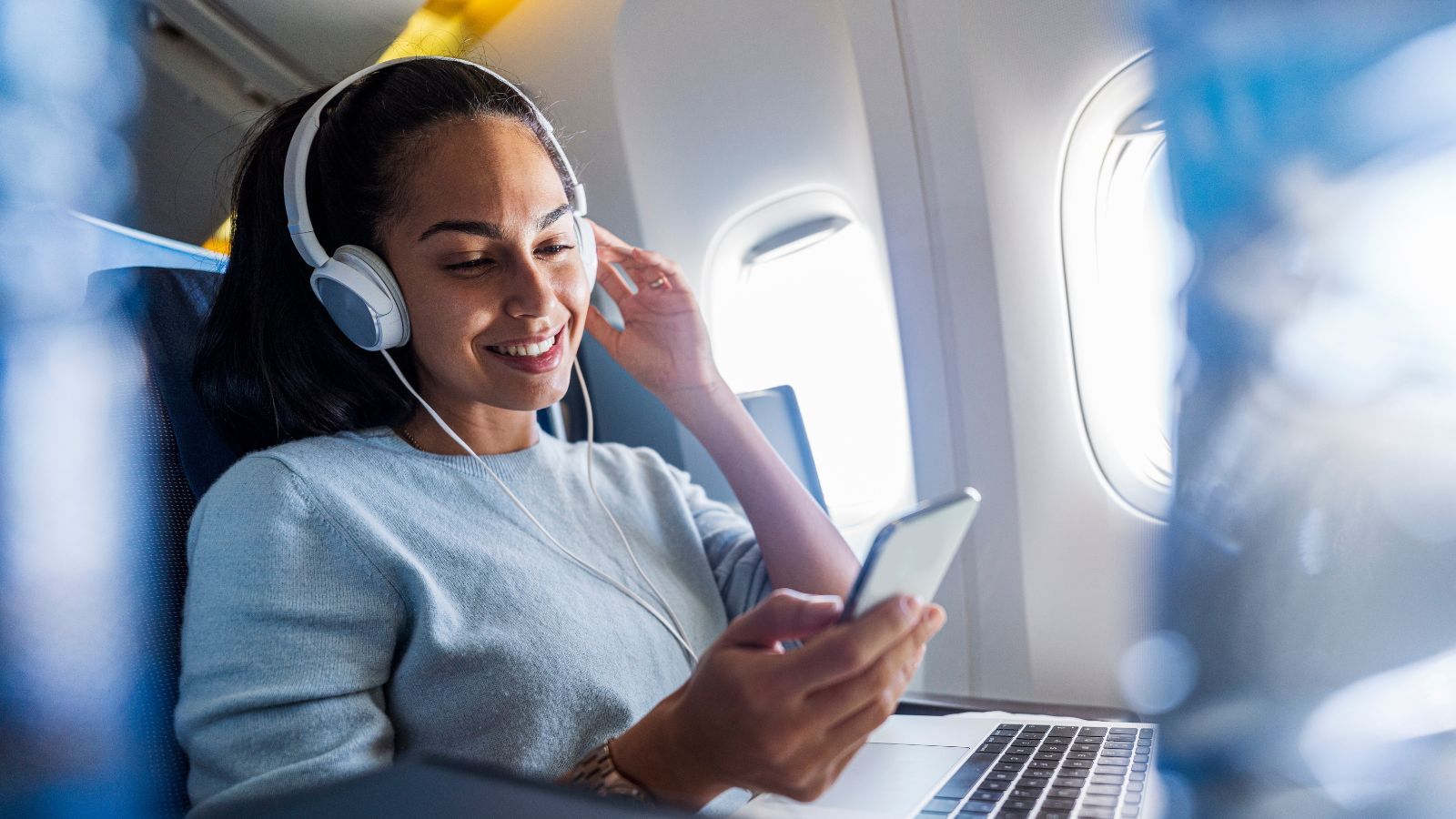 How to Listen to Music on a Plane?